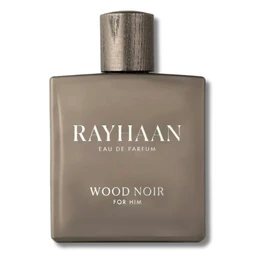 This is a matte taupe-brown perfume bottle labeled “Rayhaan” with a metallic cap, designed for men. The styling appears masculine and minimalist, suggesting a woody fragrance profile. The bottle is square with smooth, flat surfaces and a metallic silver-brown cap, featuring the text “WOOD NOIR FOR HIM” in light lettering.
