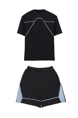 - A matching black T-shirt and shorts set featuring light blue line graphics: the T-shirt has a schematic geometric outline across the chest and shoulders, while the shorts have color-blocked light blue panels at the sides with a thin light blue trim along the hem.
- Intended for a casual, unisex or youth audience based on relaxed fit and styling, with a simple crew neck and comfortable drawstring waistband. Notable materials visible suggest a soft cotton jersey for the tee and lightweight knit for the shorts, in black with pale blue accent lines.
