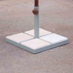 - This is an outdoor sunshade/base stand component: a square concrete/preshaped base with four inset tiles arranged in a 2x2 layout, supporting a vertical pole with a locking collar.
- Intended audience appears unisex (for general outdoor use), judged from the simple utilitarian design and neutral colors.
- Notable attributes visible: light gray base with four light-colored tiles, central vertical pole with brownish fittings, and a low-profile, sturdy square platform suitable for stabilizing an umbrella or sunshade mast. Material looks like concrete or heavy composite for outdoor durability; color palette is light gray with off-white tiles. Style is industrial/functional.