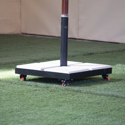 - This photo shows an outdoor sunshade or parasol base: a square platform with a central vertical pole insertion, mounted on small caster wheels for mobility.
- Intended for adults/general outdoor use (unisex styling) based on its utilitarian, neutral design and size.
- Notable visible attributes: a white square base plate on a dark frame, four caster wheels (orange/black) for easy movement, and an upright pole section inserted into the center.