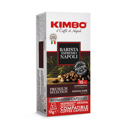 This is a box of KIMBO espresso capsules compatible with Nespresso machines. The packaging shows a white and red design with a black coffee badge and says “Barista Espresso Napoli,” indicating a medium-dark roast and aluminum capsules for home espresso use; intended audience appears unisex. Notable attributes visible: premium selection, aluminum capsules, 10 pods per box, medium dark roast, 55 g total, and compatibility with Nespresso-style machines.