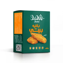 - What it is: A green box of Pane Beyti (Shahid brand) with images of fried breaded pieces on the front.
- Intended audience: Unisex (looks like a general grocery product for adults).
- Notable attributes: Bold orange product name text, teal-green packaging color, image of two fried breaded patties, boxed carton with nutrition/QR info on the side. Likely ready-to-fry or baked breaded chicken/beef skewers.