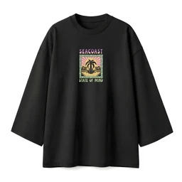 - A black oversized short-sleeve T-shirt with a colorful rectangular graphic on the chest featuring a stylized palm tree scene and sunset, framed by a border.
- Intended for a unisex or casual audience; cut is deliberately loose and roomy with dropped shoulders and wide sleeves.
- Visible attributes: black fabric, mid-length oversized silhouette, crew neckline, small square graphic with purple “SEACOAST” text and “STATE OF MIND” caption. Graphic uses warm sunset tones (pinks, yellows, greens). Avoids brand naming.