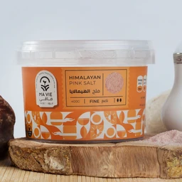 - Product: Himalayan Pink Salt in a clear plastic tub with orange labeling.
- Audience and styling: Unisex kitchen/everyday use; presented in a compact, round tub suitable for pantry storage. The design uses a warm orange label with geometric patterns and a pink salt sample image, suggesting a premium cooking or finishing salt.
- Visible attributes: Pink Himalayan salt, finely ground, 400g, clear lid, orange patterned label, bilingual (Arabic/English) text, square container on a wooden surface.