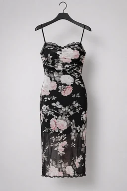 - What the product is: A fitted, knee-to-calf length dress with a black base and pink/white floral print, featuring delicate lace trim along the neckline and hem.
- Apparent audience: Women (adult female styling, thin straps, form-fitting silhouette).
- Notable attributes: Floral pattern in pink and white on black, spaghetti straps, lace detailing at top and hem, sheer or semi-sheer overlay, bodycon/fit-and-flare vibe with a midi length.