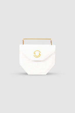 - What it is: A small white handbag/clutch with a geometric, hexagonal shape and a gold-toned circular clasp.
- Intended audience: Women (styled as a chic, elegant accessory).
- Notable attributes: White textured material, gold-tone hardware, compact envelope-style flap with a small top handle.