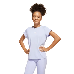 This is a light lavender/soft purple short-sleeve athletic T-shirt and matching leggings set. The model appears to be a young woman or teen, suggesting a women's or juniors size range; the look is sporty and form-fitting with a relaxed tee and slim leggings. Notable details include a simple round neckline, short sleeves, and a small white logo on the chest, with lightweight, breathable fabric in a monochrome colorway.
