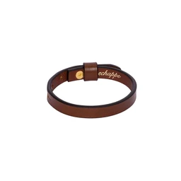 - What it is: A slim, single-band bracelet made of leather with a small strap keeper and a gold-tone stud closure.
- Audience and styling: Designed as unisex; simple, minimalist, and casual in style suitable for everyday wear.
- Materials and colors: Brown leather strap with a slightly darker edge, gold-tone hardware, and subtle branding on the inner side.