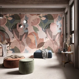 - What the product is: A lifestyle interior decor setup featuring soft seating poufs/ottomans and a cozy sitting area within a stylishly wallpapered room.
- Intended audience: Unisex; looks suitable for adults or home decor enthusiasts.
- Notable attributes: Neutral and muted earth-tone colors (rose, sage green, soft peach, dusty pink) with a large botanical leaf pattern on the wall. Visible items include round upholstered poufs (green and brown) and a low seating area with a blue ottoman/bench, a floor lamp cluster, and a small side table with decor items. The style is contemporary with organic textures and a warm, lounge-friendly vibe.