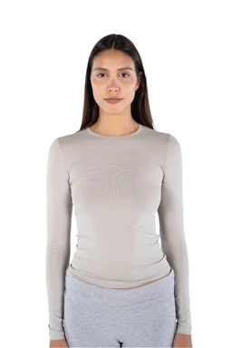 This is a light gray, long-sleeve knit top with a basic crew neckline. It appears form-fitting and intended for women, shown on a female model with straight, dark hair. Notable attributes: smooth, plain fabric likely a stretchy knit, solid light gray color, slim fit, and simple, minimalist style.