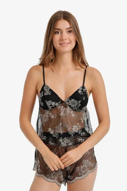 - What it is: A sheer floral cami pajama set featuring a lace-trimmed, two-piece style with a camisole top and matching shorts.
- Target audience: Women (adult female styling, slim adjustable spaghetti straps, and feminine fit).
- Notable attributes: Sheer black mesh fabric with white floral lace embroidery, layered peplum-like overlay at the hem of the top and short shorts, delicate scalloped lace edges, black color with light contrast floral pattern.