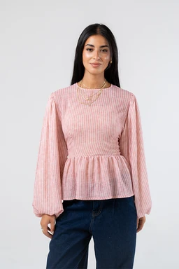 - What it is: A pink smocked peplum blouse with voluminous balloon sleeves. The bodice features smocking at the chest with a short peplum flare at the waist, and the sleeves are full and gathered.
- Intended audience and styling cues: Fits women's fashion, with a fitted upper bodice and feminine, statement sleeves suitable for casual to dressy occasions.
- Notable materials and colors: Soft pink textured fabric with subtle vertical stripe-like texture; long, billowy sleeves; crew neckline.