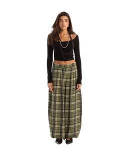 - What the product is: A pair of wide-leg, balloon-style pants with a green plaid pattern.
- Intended audience and styling cues: Appears designed for women, with a mid-rise waist and loose, relaxed fit from the hips to the ankles.
- Notable visible attributes: Olive/green plaid fabric, elastic or drawstring waist, ankle-length but very wide legs, paired with a black off-the-shoulder long-sleeve top and simple sandals in the photo. No visible branding.