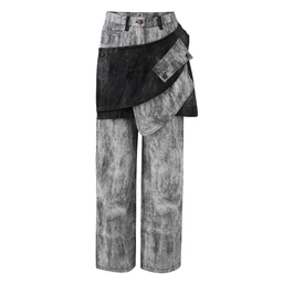 - The EdgeSplit Pants: a pair of wide, straight-leg pants with a distinctive layered panel design in a distressed gray denim look, plus darker black fabric overlays at the waist and hip area. 
- Audience and styling cues: appears unisex or gender-neutral with a utilitarian, avant-garde streetwear vibe suggested by oversized, multiple-panel detailing and ties/fasteners at the waist. 
- Notable materials and colors: gray/stonewashed denim-like fabric with black contrast panels; heavy, textured fabric appearance; cropped layering elements contribute to a bold, architectural style.