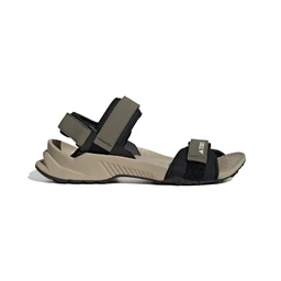 This is a sporty open sandal designed for outdoor or casual wear, likely targeted at men or unisex due to its neutral sizing and rugged styling. It features a beige/khaki and black colorway with adjustable Velcro straps across the midfoot and heel, a cushioned beige footbed, and a chunky molded sole with tread for grip. Material appears to be synthetic/mesh uppers with fabric straps and a durable rubber outsole, suitable for outdoor activities.