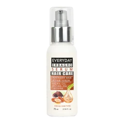 This is a light, white plastic bottle with a pump spray top containing Everyday Erbagro Hair Serum for hair care. The model text and labeling suggest a unisex target audience, with a compact 75 ml size and a silver spray cap. Visible ingredients/icons hint at oils (argan, jojoba) and a glossy, professional styling look.