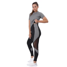 - What it is: A women's athletic outfit featuring a short-sleeve heather-gray T-shirt paired with color-blocked high-waisted leggings that have mesh inserts and contrasting panels.
- Intended audience: Women (athletic/fitness wear).
- Notable attributes: Gray T-shirt with a simple, solid knit; black and gray color-block leggings with sheer mesh panels and contrasting light gray angular inserts; cropped/tight fit and athletic, performance look; white sneakers shown for styling.