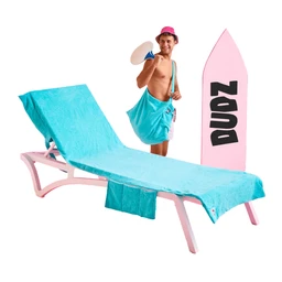 A bright, all-in-one pool/beach setup featuring a lounge chair covered with a turquoise towel. The scene includes a young male model in swim shorts, a pink hat, and a pink surfboard-style prop, suggesting a playful summer vibe for a unisex audience. Notable visible attributes: turquoise towel draped over a pale pink lounge chair, light pink frame, with a turquoise beach bag or accessory detail and a pink surfboard with bold “DOUZ” lettering.