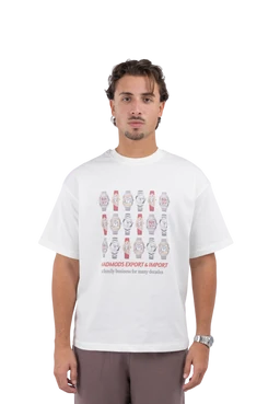 - The product is a white short-sleeve T-shirt featuring a graphic print of multiple illustrated watch faces arranged in a grid on the chest area.
- Intended audience appears to adults (unisex leaning masculine) based on the fit and model styling, with a relaxed, oversized cut commonly worn by men.
- Notable attributes: white cotton tee, graphic print in muted red/gray tones, round neckline, with a casual, streetwear aesthetic. No branding visible.