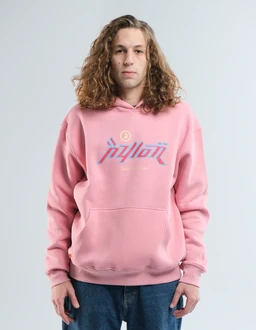- A pastel pink hoodie with a front kangaroo pocket and a drawstring hood. The garment is worn by a male-presenting model with shoulder-length wavy hair, standing facing the camera.
- Intended audience: men's/unisex based on styling and fit. 
- Notable attributes: soft pink color, graphic text/logo in blue on the chest, relaxed/oversized fit, long sleeves with ribbed cuffs, and a matching ribbed hem. Material appears to be fleece or cotton-blend.
