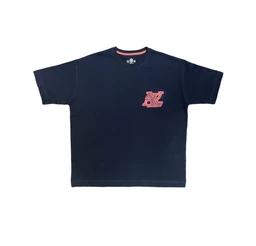 A navy blue oversized short-sleeve T-shirt with a pink graphic emblem on the left chest. The fit appears broad and boxy, suggesting a unisex or men's cut, sized oversized. Notable details include a subtle pink neckline trim and a small pink graphic logo on the chest, with a smooth jersey-like fabric and a dark blue color throughout.