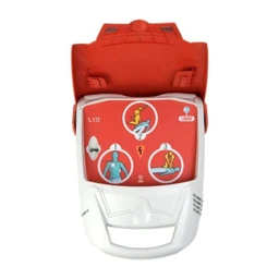 This is a fully-automatic external defibrillator unit with a red and white housing. The visible model appears child-friendly, featuring bright red panels and simple pictorial instructions on the front, suggesting a general audience rather than a specific gender. Notable attributes include a red top cover, white lower body, and instructional graphics indicating step-by-step usage (electrode pad icons and a rescue sequence).