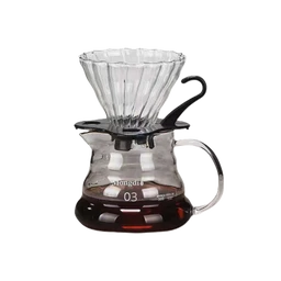 This is a glass pour-over coffee maker setup featuring a conical, ribbed glass filter sitting atop a curved carafe. The visible model appears unisex in styling, with a clear glass funnel and a dark fluid-filled base, complemented by a black plastic hanger/handle release and a plastic/drip-free hinge. Notable attributes include the clear crystal-like glass funnel, dark liquid coffee in the carafe, and a simple, functional aesthetic suitable for manual pour-over brewing.