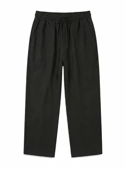 - What it is: A pair of wide-leg black pants with an elastic waistband and a drawstring.
- Audience: Looks unisex or men's style, based on cut and fit; suitable for a relaxed, casual look.
- Notable attributes: Black linen fabric with a loose, wide silhouette, mid to full-length legs, subtle gathering at the waistband, clean minimal styling without visible pockets or embellishments.