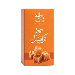 - What the product is: A box of Nazim caramel-flavored coffee confectionery (caramel cubes) with an orange packaging.
- Apparent audience and styling: Unisex presentation suitable for adults; warm orange packaging with white Arabic script and an image of caramel cubes, suggesting a sweet, gift-like item.
- Notable attributes: Bright orange box, white Arabic lettering, image of caramel cubes with caramel sauce, emphasis on caramel flavor and candy texture.