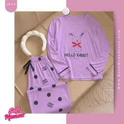 - Product: A lavender/purple long-sleeve pajama set featuring a bunny motif on the top and polka dots on the pants.
- Intended audience: Likely girls (based on pastel color, playful bunny graphic, and polka-dot pattern).
- Notable attributes: Soft lavender color, "Hello Rabbit" graphic with a bunny and red bow, black polka dots on pants, elastic waistband with a black drawstring, and ribbed cuffs on sleeves. Material appears to be soft, cozy knit suitable for loungewear.
