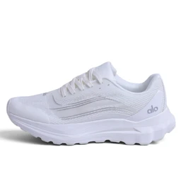 A white athletic running shoe with a low-cut profile and breathable mesh upper. It appears sized for adults (unisex/men or women) based on the neutral styling and standard lace-up design, with a cushioned midsole and a textured outsole for traction. Notable features include a clean all-white colorway, subtle tonal overlays, and a lightweight, airy construction suitable for everyday comfort.