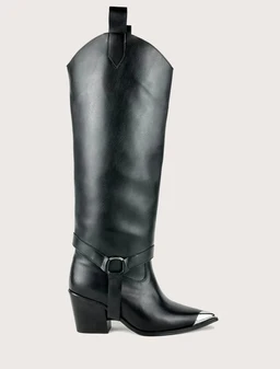 - What the product is: A classic detachable long boot with a tall shaft and Western-inspired styling, shown in black leather.
- Apparent audience: Unisex-leaning toward adults; overall design and heel height suggest a Western boot aesthetic suitable for men or women depending on sizing.
- Notable attributes visible: Smooth black leather, pointed toe with a metallic toe cap, mid-height stacked heel, decorative strap with a buckle around the ankle, pull-tab at the top, and a subtle seam detailing on the shaft. The boot appears to have a detachable upper component or overlay as part of the design.