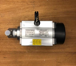 - What it is: A compact pneumatic or electro-pneumatic actuator with a cylindrical black end cap and metal body, featuring a control knob/handle and a small mounting hook. It appears to be a rope-length indicator accessory used with machinery.
- Intended audience: Unisex (industrial/MRO users) given its utilitarian, mechanical styling and mounting hardware.
- Notable visible attributes: Silver aluminum body with black end cap, a vertical black handle/knob, mounting holes, and a label plate with technical specs. The overall look is industrial, with a small yellow warning sticker on the body. Material appears to be metal (aluminum) with a plastic/metal composite end. Color scheme is metallic silver, black, and yellow warning details.