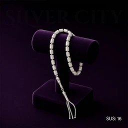 - Product: A 33-bead cylindrical beaded prayer rosary (Tasbih) in 925 sterling silver, laser-decorated, with a 23 cm length. The beads are uniform rectangular cylindrical shapes with a hanging tassel at the end.
- Intended audience: Unisex (suitable for men and women), judged from the classic metallic silver finish and simple, elegant styling.
- Notable attributes: Material appears to be silver (925 derivate), color is bright silver, style is cylindrical faceted beads with a slim tassel end, length about 23 cm. The overall look is minimalist and refined.