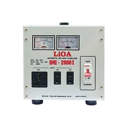 - This is a compact electrical voltage stabilizer/auto transformer unit with two analog meters on the front, labeled DR-2000 II for automatic voltage stabilization.
- Intended audience inferred from presentation: unisex adult use (general electrical appliance), with a rugged industrial look suitable for workshop or home electrical setup.
- Visible attributes: metal case in light gray, two front panel meters (amp and volt or similar), multiple outlet sockets (three standard outlets and a couple of universal sockets), a red power switch with a safety cover, and four rubber feet for stability. Styling is industrial, utilitarian, with LiOA branding and Vietnamese manufacture notes visible. Main color is gray/silver with black and red accents. Material appears to be metal housing with plastic outlets and meters.