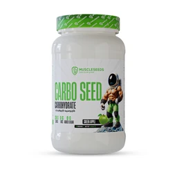 A white plastic jar of carbohydrate powder labeled “CARBO SEED” with a green cap. The design features bold green text and a small astronaut-like character, suggesting a fitness supplement target. Visible attributes include a green apple flavor tag and the brand name “MuscleSeeds,” with emphasis on carbohydrate powder and energy-support messaging. Audience appears to adults (unisex) for sports or gym use; the container and graphic styling imply a fitness supplement product. Notable materials/colors: white jar, green lid, green and black labeling; product type: powdered supplement.