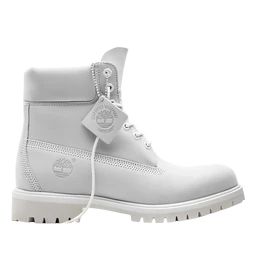 This is a white, lace-up ankle boot with a rugged, chunky sole. It has visible stitching and panel detailing, a padded collar, and a hanging tag, suggesting a durable, utilitarian style for unisex or men’s wear. The notable materials appear to be smooth leather or synthetic leather with a matte finish, and a thick treaded rubber outsole.