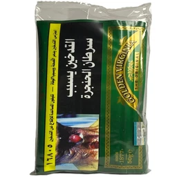 - Product: Golden Virginia Egyptian tobacco (unbranded in photo text only), 50 g packaging visible.
- Audience: Unisex (the packaging appears generic tobacco tin/packet suitable for adults; no gendered design elements).
- Notable attributes: Green and black color scheme with gold accents, vertical gold ribbon label reading “GOLDEN VIRGINIA THE ORIGINAL,” Arabic script on the front, small image of a landscape or field, rectangular pouch-like packaging. Material appears to be a foil or plastic pouch.