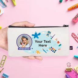 - What the product is: A white zippered pencil case with a printed graphic that reads “Your Text Here” and a placeholder for a photo, designed to be customized with a child’s name and image.
- Apparent audience and attributes: Targeted for children (unisex), shown with a kid-friendly design and bright colors; the style is playful and personalized, suitable for school use.
- Notable materials and features: Faux leather-looking white exterior with a black zipper; printed graphic includes a circular photo slot, painter’s palette and art-themed illustrations, and a space for custom text.